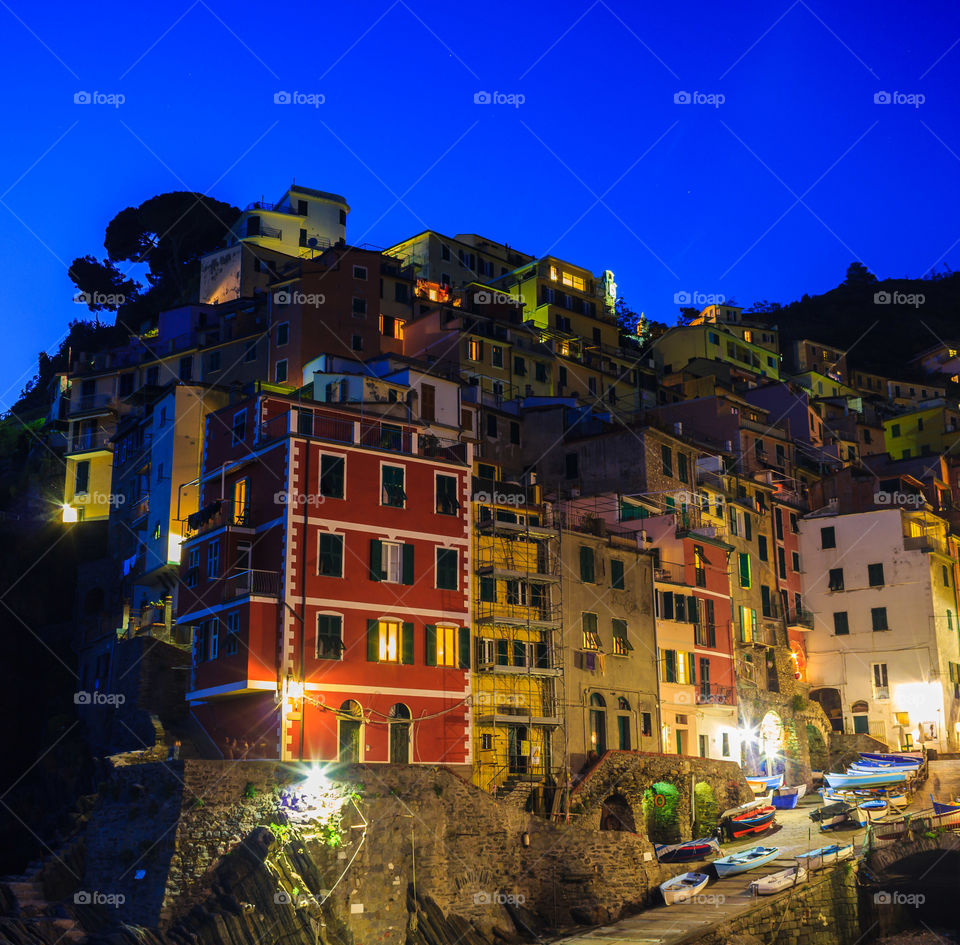 Cinque Terre. Riomaggiore  fisherman village on cliff at Cinque Terre after sunset at night, Italy