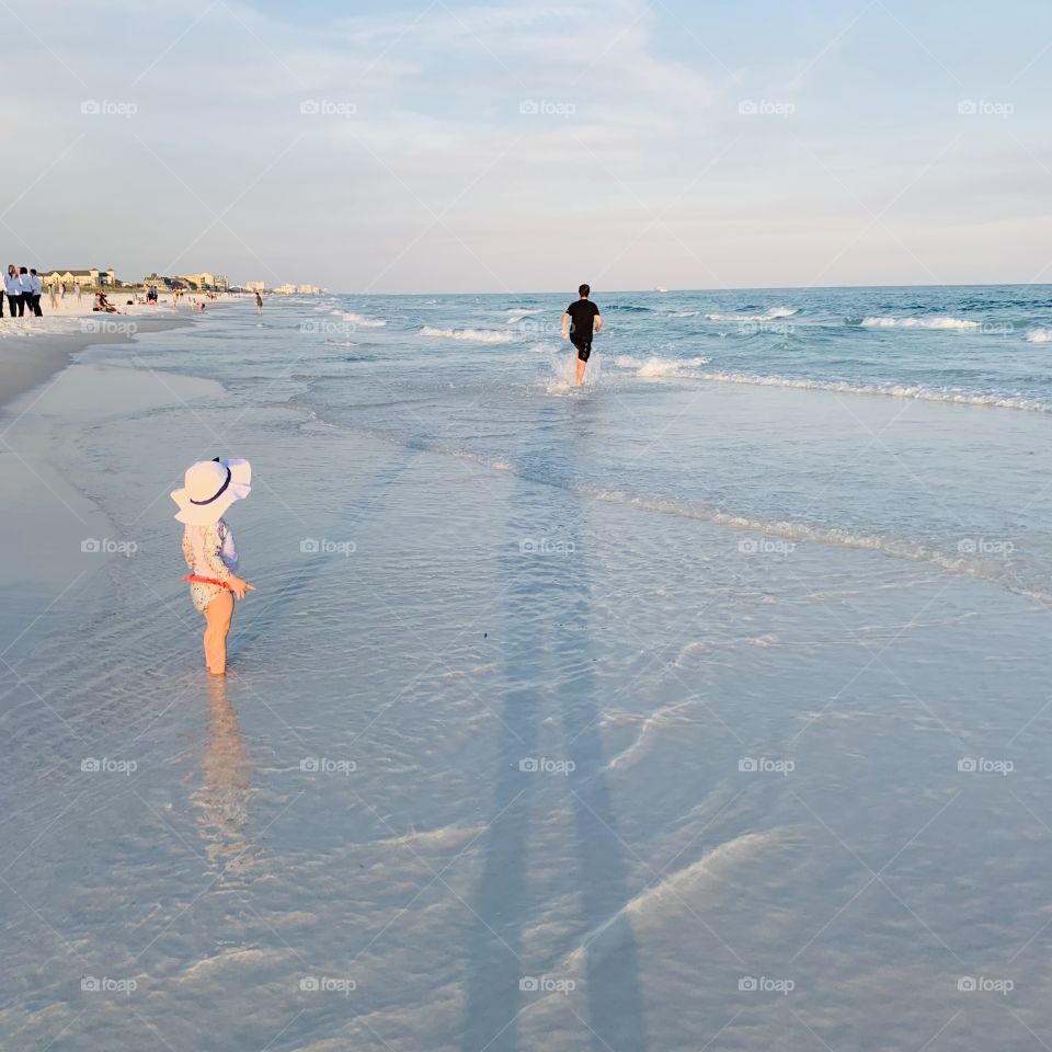 Running into the Emerald Coast at Sunset
