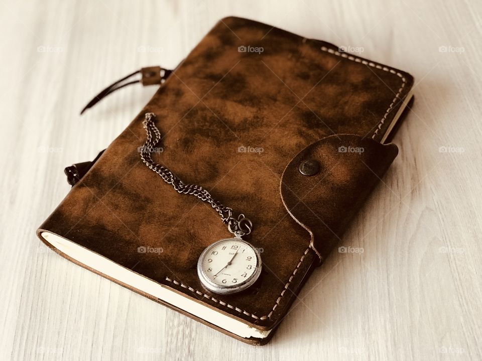 My handmade leather notebook and grandfather’s old watch