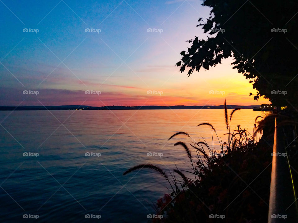 peaceful sunset by the lake