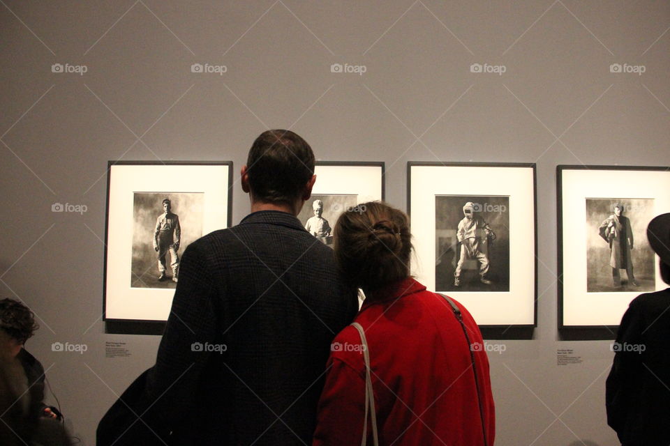 Couple at the picture exhibition