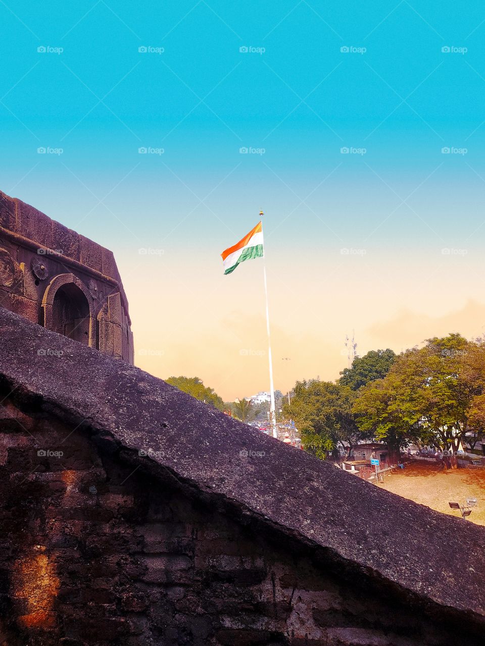 Indias Flag over Shaniwar wada Palace Pune Maharashtra