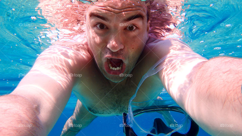 Man swimming underwater