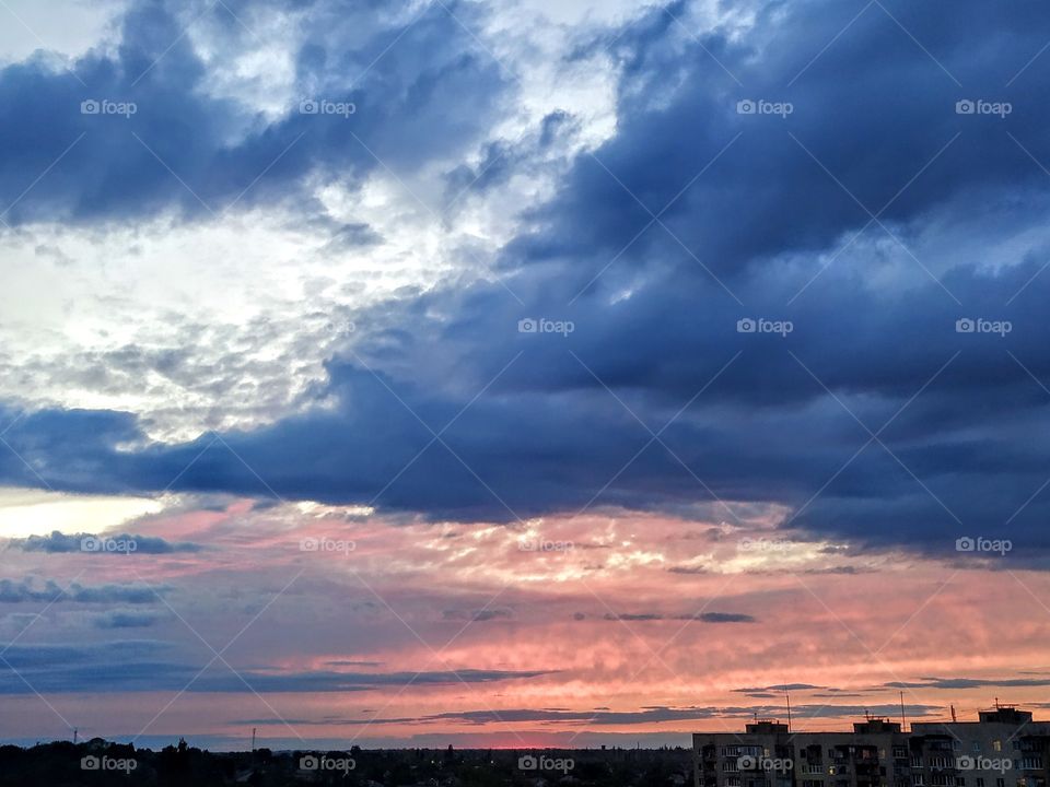 Pink and dark blue clouds
