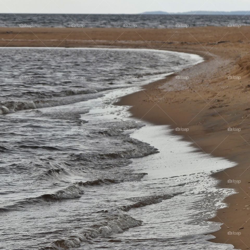 Waves on the beach at Lagaoset, mouth of the Lagan river on the Swedish west coast