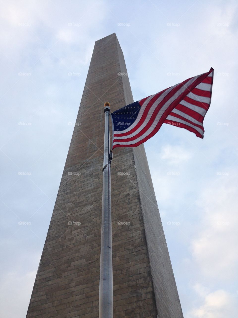 Flag flying below the Washington Monument in Washington, DC