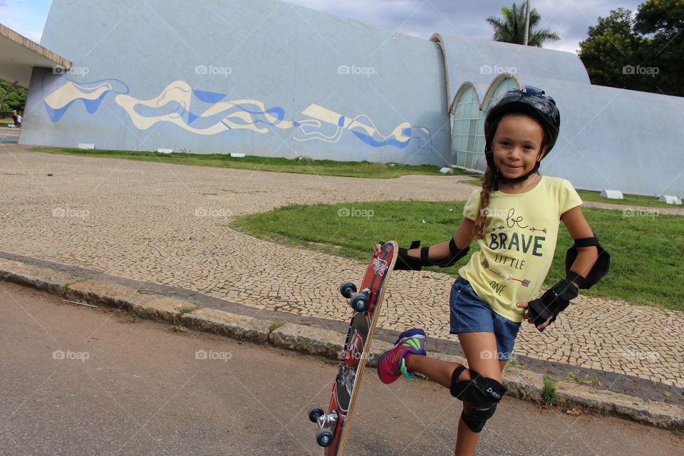 Little girl skateboarding