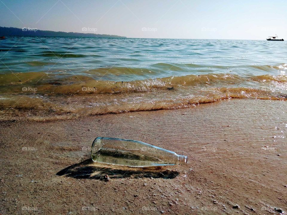 bear bottel at beach