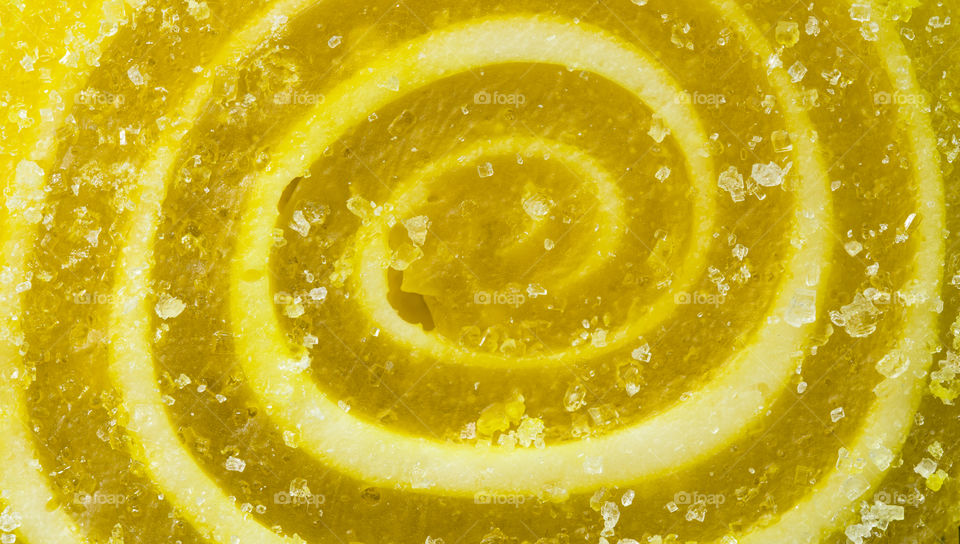 yellow marmalade covered with sugar,  close up.  sweet macro