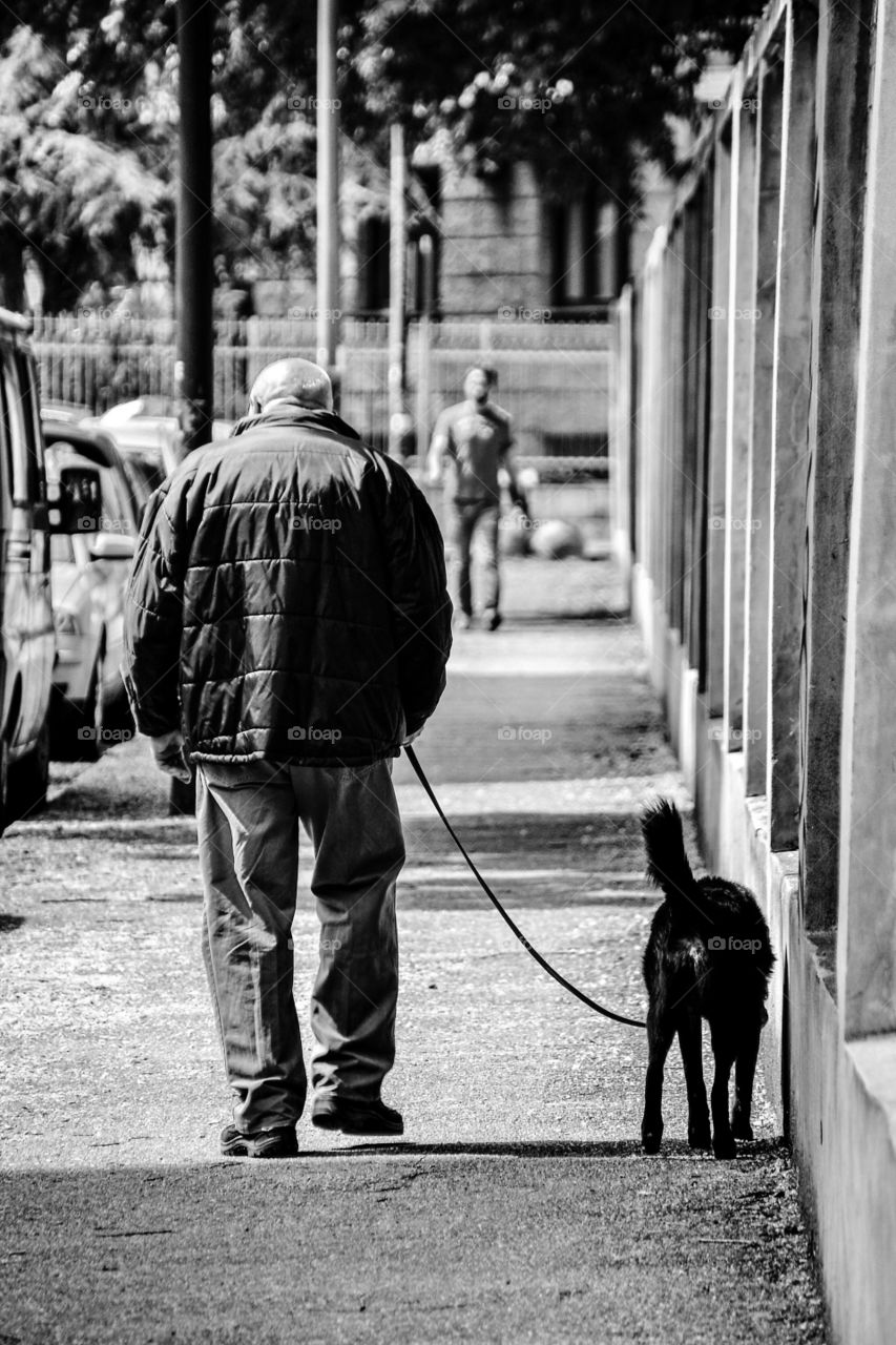 elderly man walking