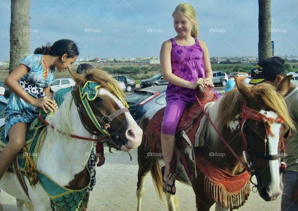 Happy day, girls going for a ride @Casablanca, Morocco