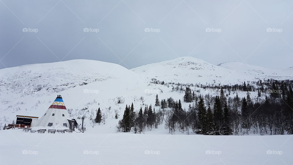 Mountain view covered in snow.