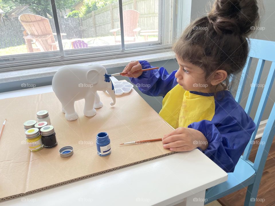 Little girl paints elephant, painting elephants, toddlers doing crafts, making art with toddlers, painting elephants with mommy, making elephants