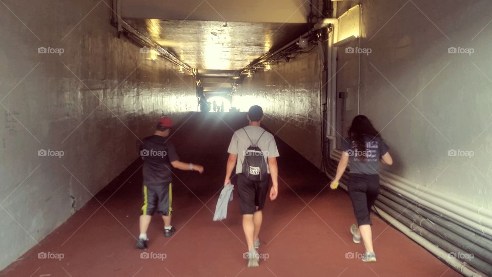 university of michigan walking through the tunnel at the big house