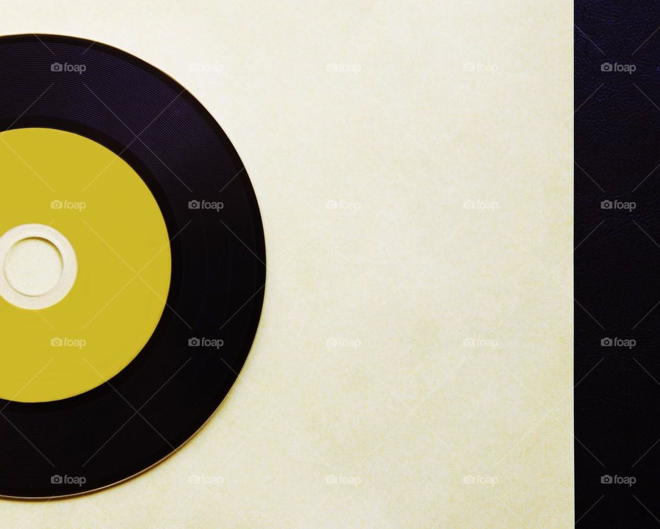Yellow vinyl disc background 