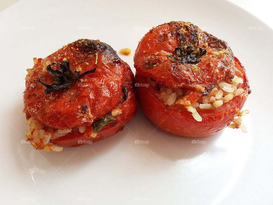 baked tomatoes  with rice