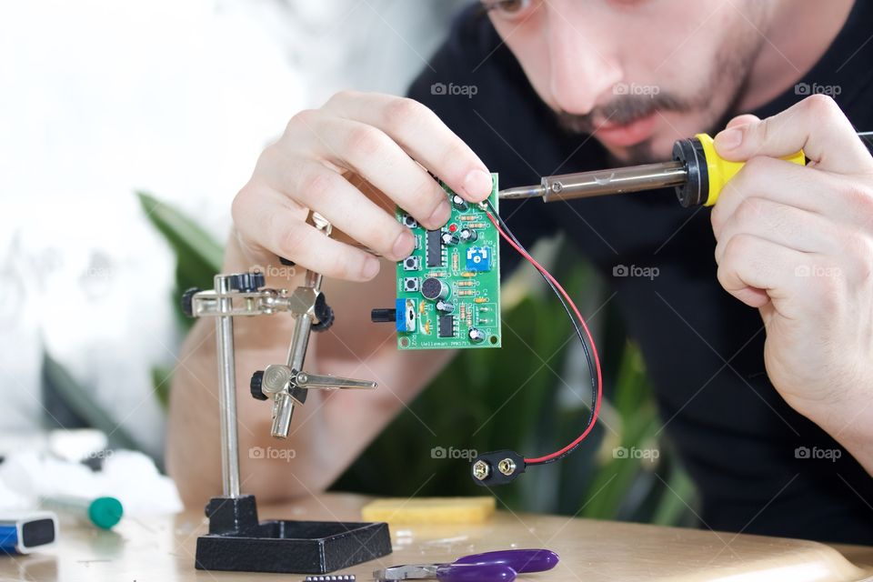 The soldering of electronics 
