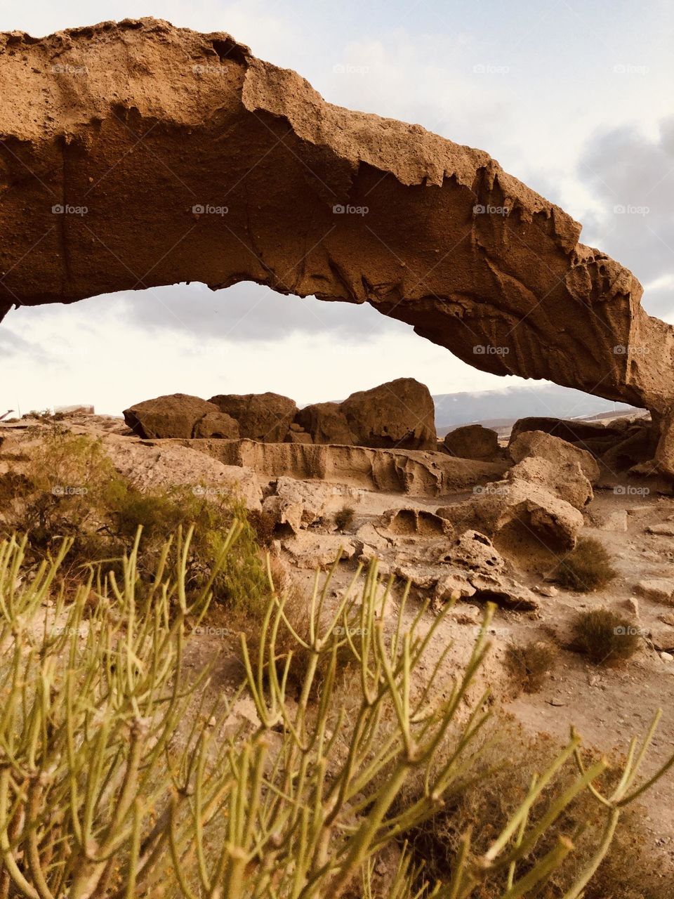 Stone arch in the desert , Tenerife , Spain