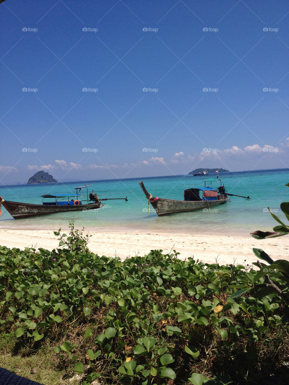 Boats at the beach in PhiPhi island Thailand
