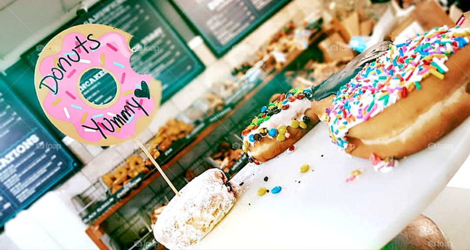 New Jersey Bakery Colorful Donuts, powder sugar, candies, frosting, and rainbow sprinkles!