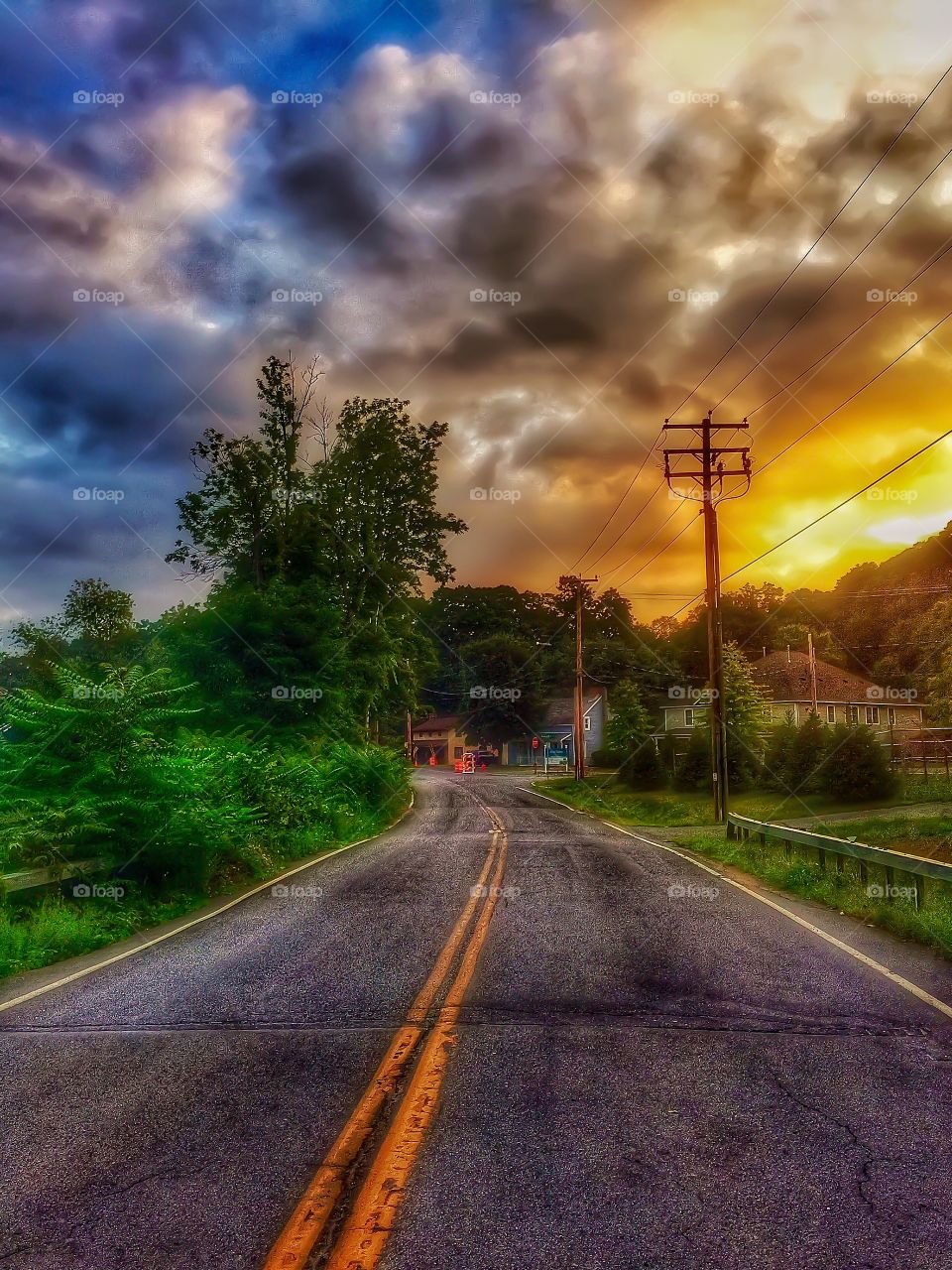 Sunrise on the street. Sunrise on a country road