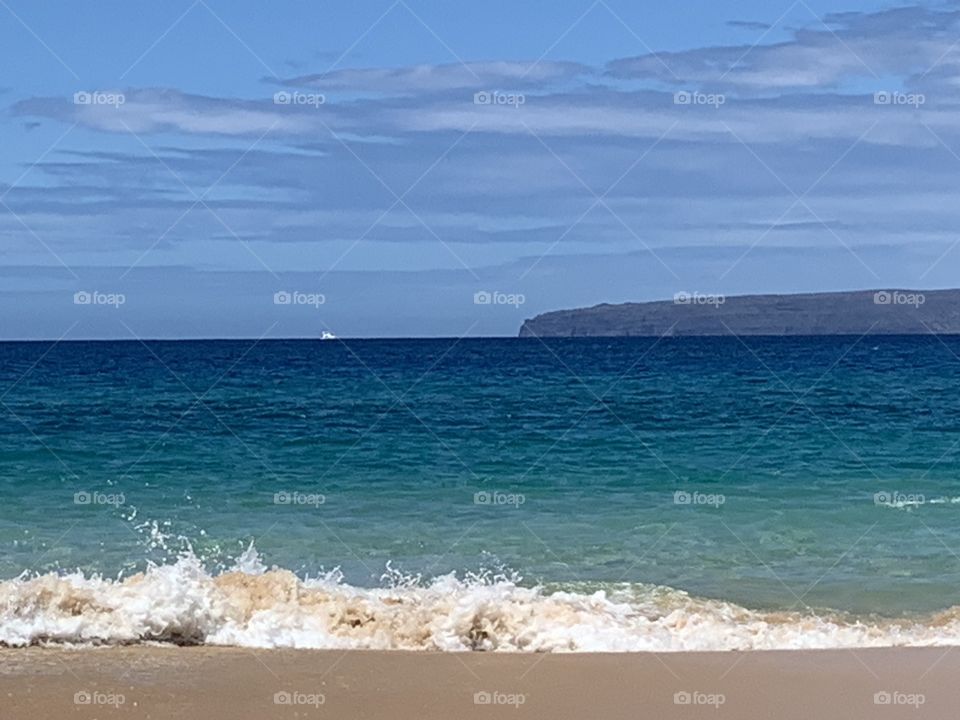 Maui blue ocean and rolling waves 