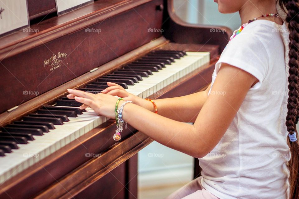 Child and piano