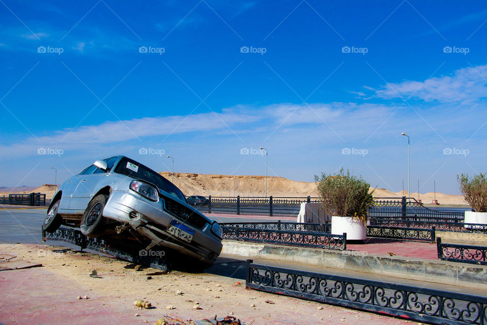 I was travelling on the high way and found this strange accident. Maybe it was dark when he crashed.