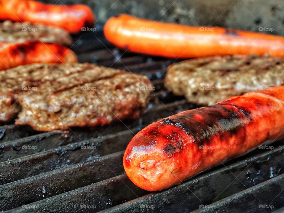 Burgers And Dogs On The BBQ