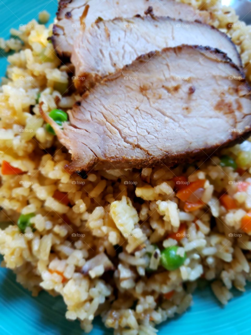 Fresh homemade Pork Fried Rice with lots of vegetables and flavor 