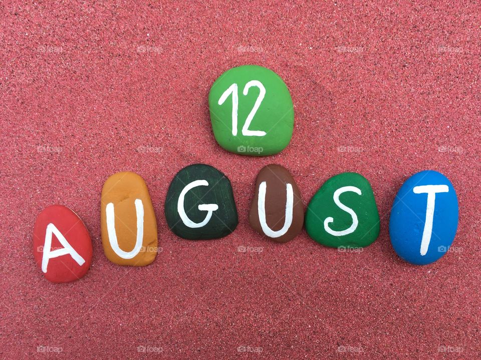 12 August, calendar date on colored stones 