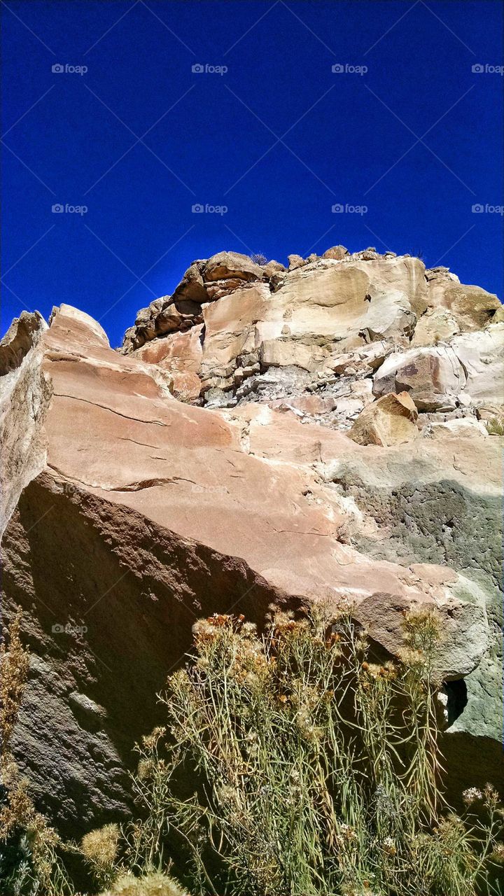 Bright blue skies and intriguing rock cliffs of far west Colorado