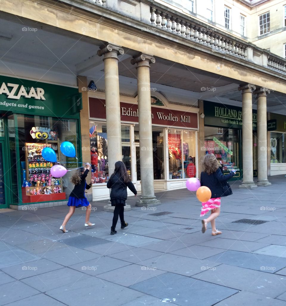 Party's Over. Children running with party balloons