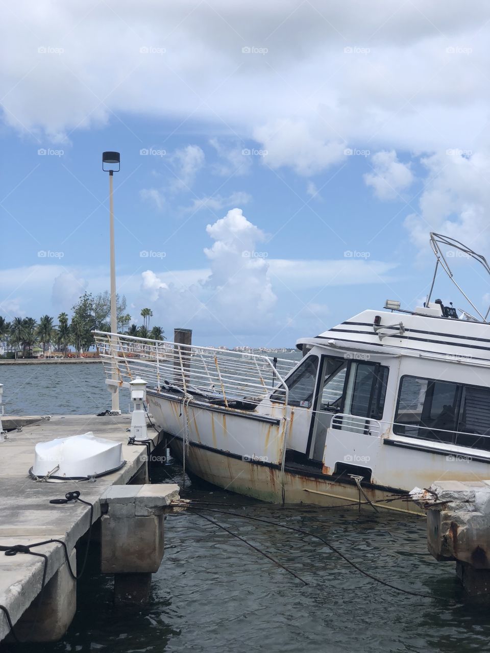 Rusted boat at the pier