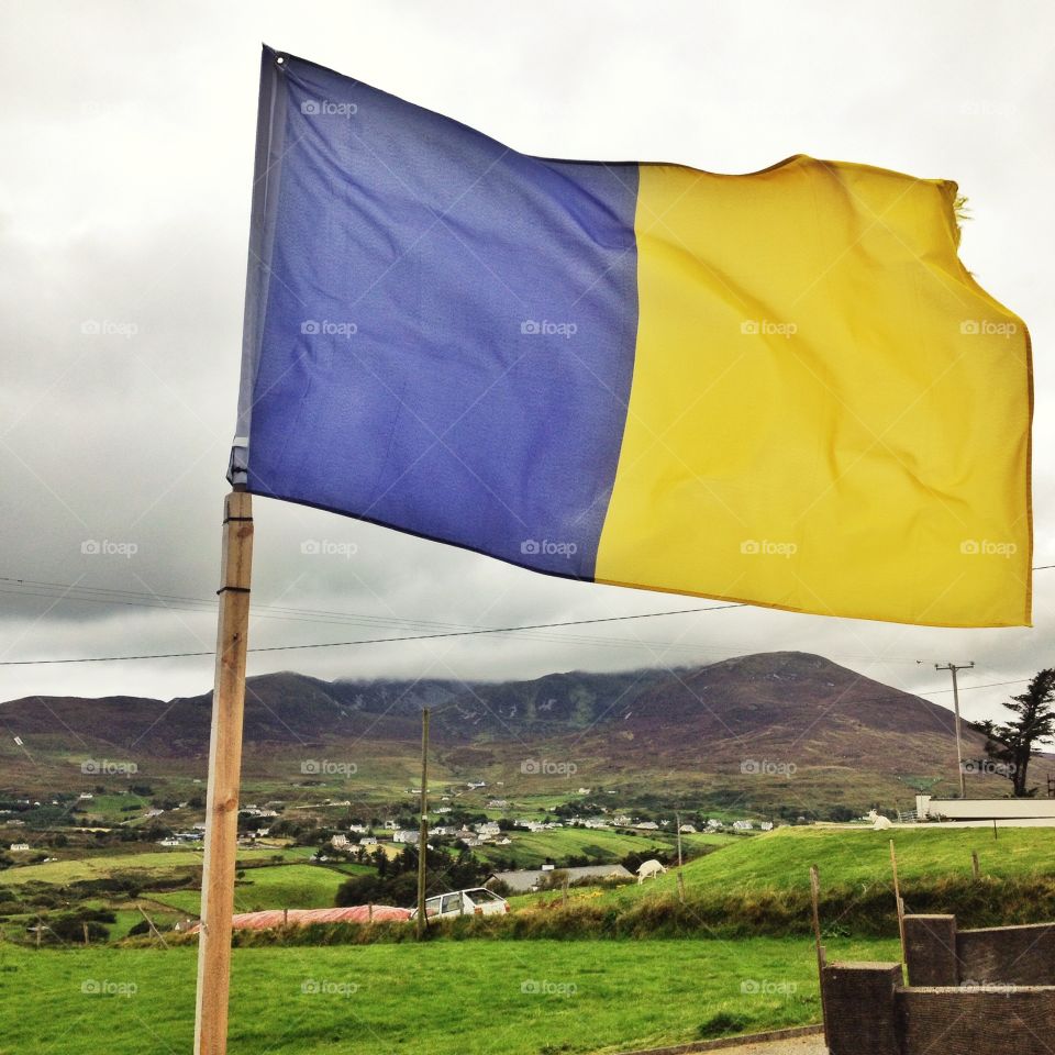 Blue and yellow Flag. Blue and yellow flag flying in the wind