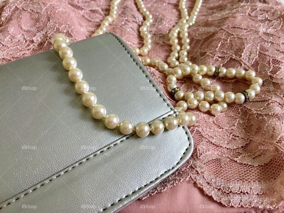 Party bag and pearl necklace