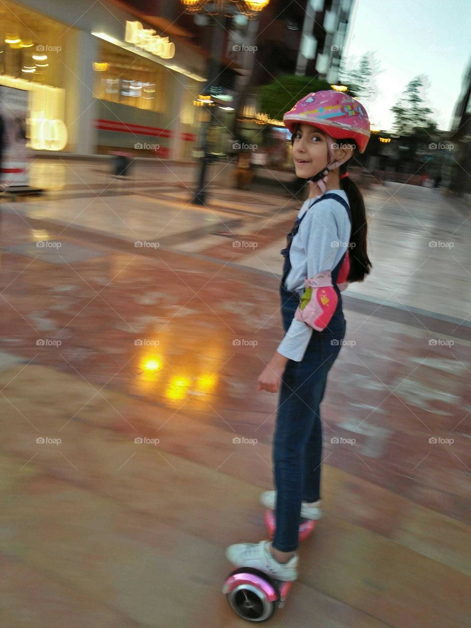 A child on electric skate.