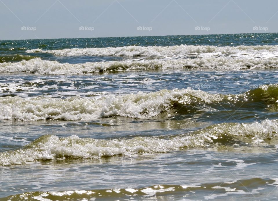 Breaking waves at seashore