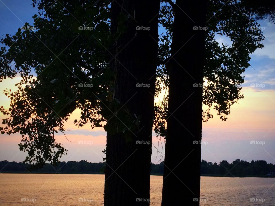 Silhouettes and sunset sky 