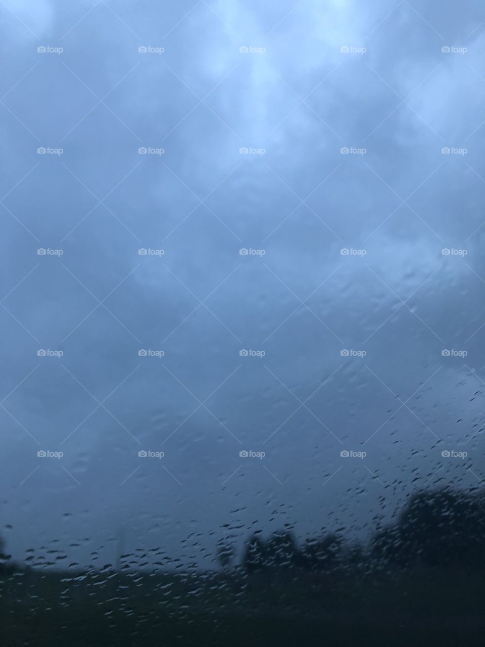 Rainy sky through a window