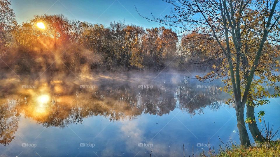 foggy river sunset