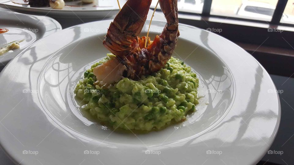 Lobster with green. pea risotto