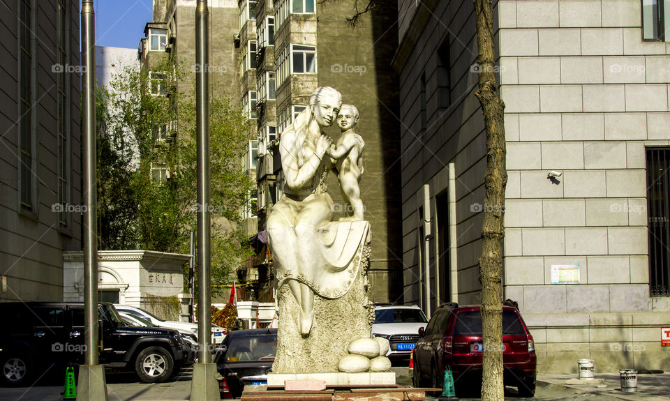 A Statue of a mother and a son