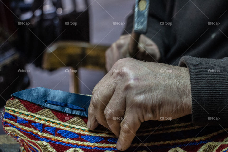 This man is creating handmade purses with very good leather and amazing colors. I am posting the stages of cutting and finishing those purses using different tools.