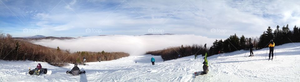 Skiing into the clouds