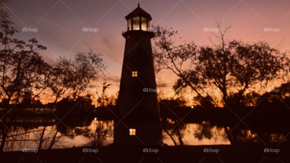 Beautiful Evening During Twilight Colors are strong and vibrant. Evening turning to Night. Beautiful Backlit Landscape lake waters seen with Reflections of the Night.