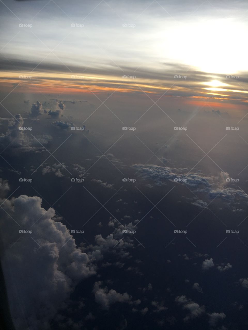 Aerial view of cloudy sky at sunset