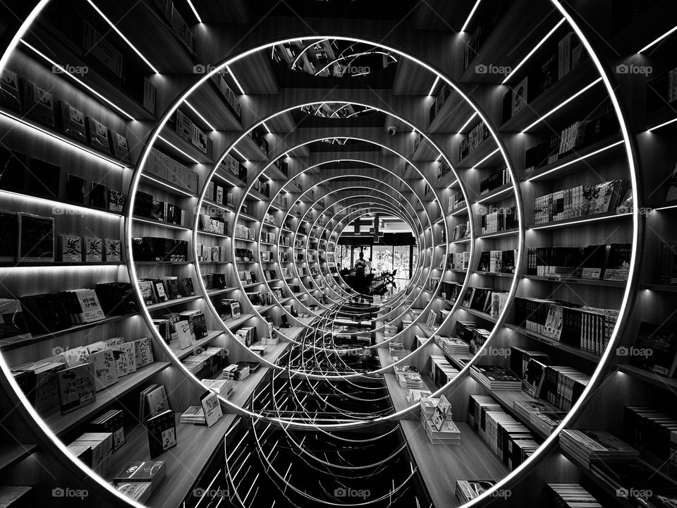 Symmetrical shapes and lines in a modern bookstore 