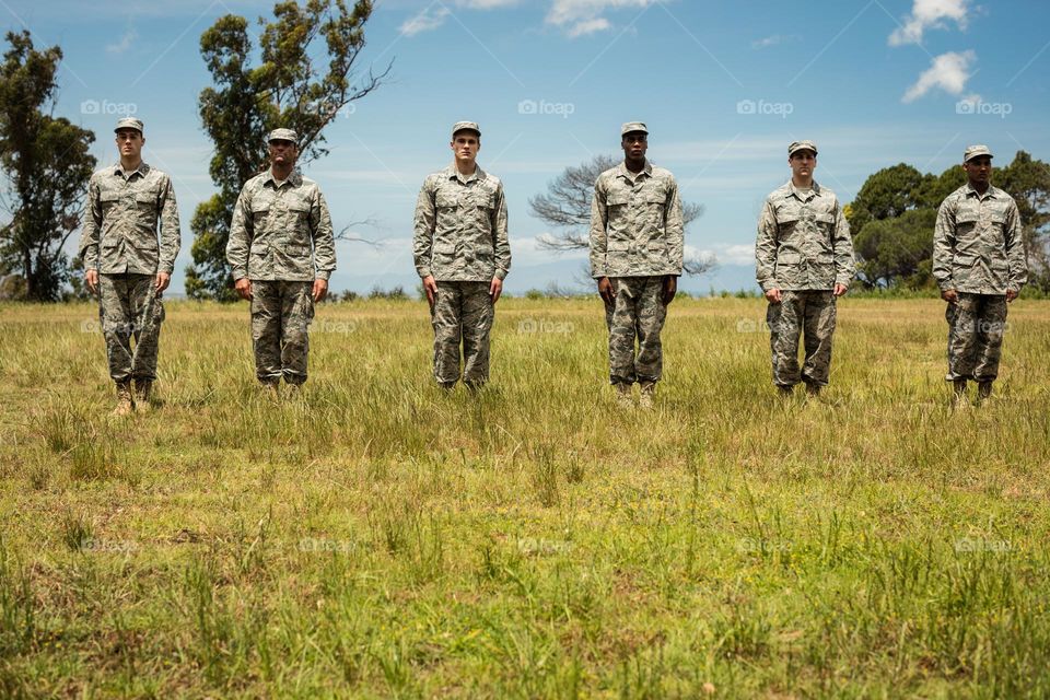 Soldiers are standing straight at the boot camp.