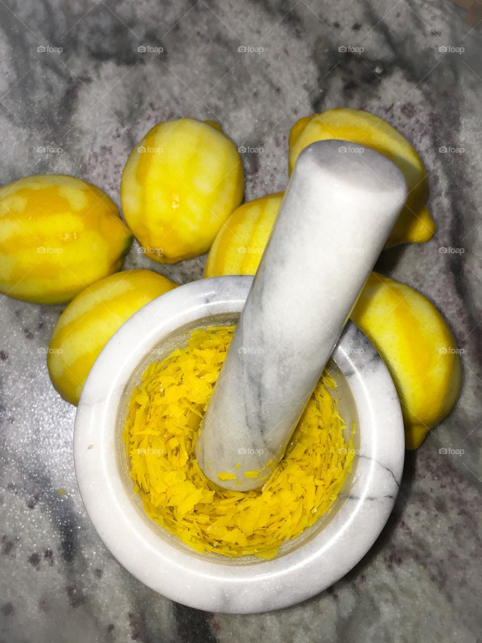 Lemons crushed in pestle and mortar